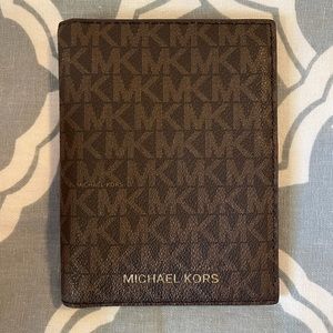 Michael Kors passport wallet.